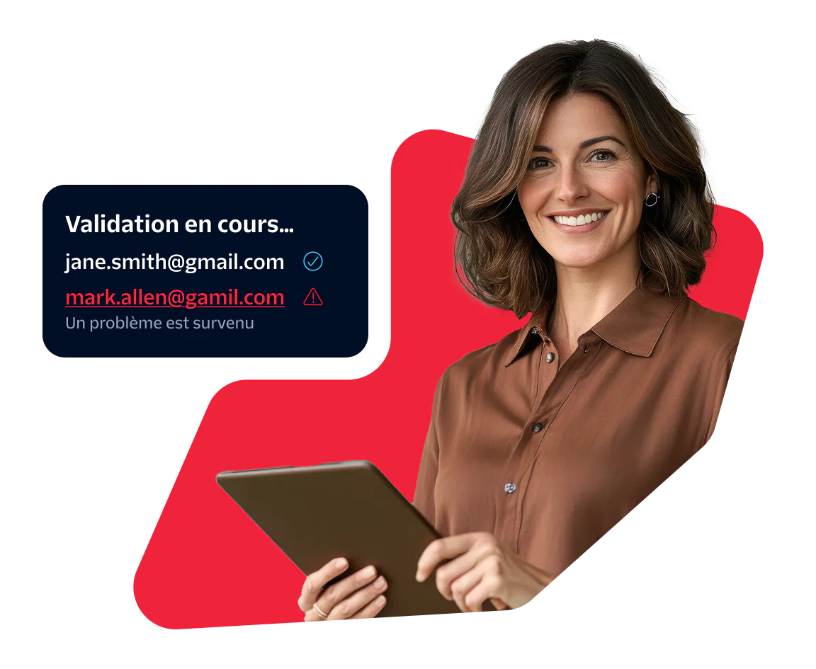Woman holding a tablet with a screen showing email validation results
