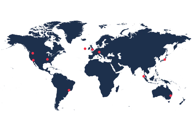 World map with red dots marking different international locations.